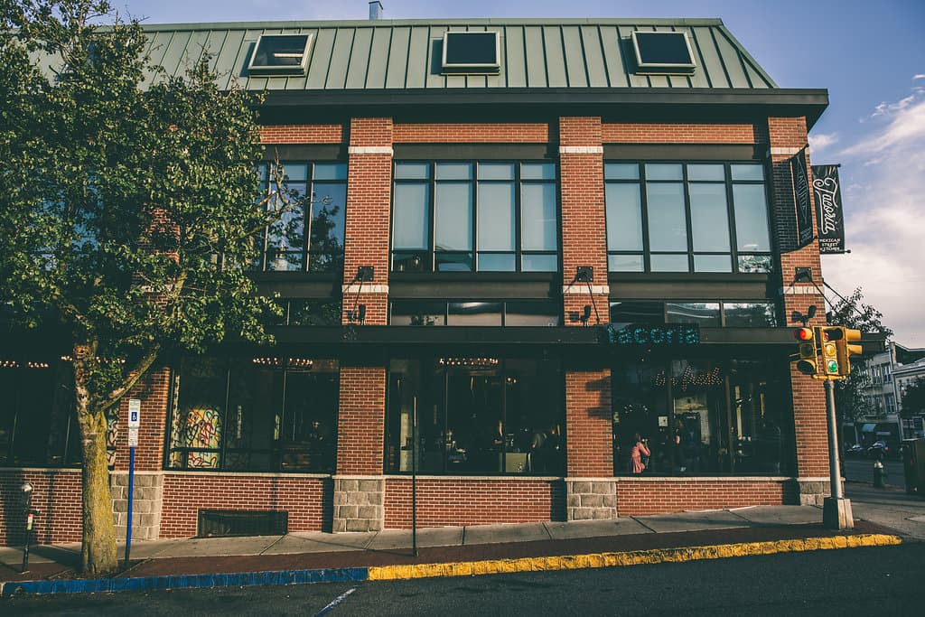 Exterior of Montclair with black framed windows and red brick